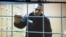 Russian opposition leader Aleksei Navalny speaks from prison via a video link in Petushki, Russia, in January.