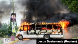 Кулиакан шаарындагы тополоңдо тартылган сүрөт. 