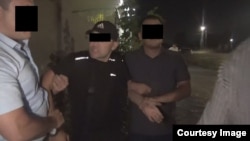 Аскер кызматкерлерин кармоо учуру. УКМК тараткан сүрөт.