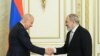 Armenian Prime Minister Nikol Pashinian (R) receives Russian Ambassador to Armenia Sergey Kopyrkin in Yerevan, May 27, 2022.