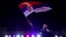 Bosnian Serb leader Milorad Dodik waves the Serbian flag to thousands who gathered in Banja Luka, Bosnia, on October 25.
