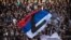 Partizan supporters wave a Serbian flag with the letter Z -- a symbol of support for Russian military action in Ukraine -- during a match in Belgrade in April.
