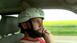 Under Shellfire, A Red Cross Team Tries To Evacuate A Ukrainian Village