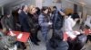 Armenia - Residents of Yerevan queue up at a polling station to vote in a presidential election, 18Feb2013.