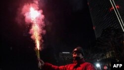 عکسی از جشن سال نو ۲۰۲۲ در مقابل یک آسمان‌خراش ۱۲۳ طبقه در سئول