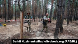 Масове поховання біля Ізюму на Харківщині, 15 вересня 2022 року. Фото ілюстративне 