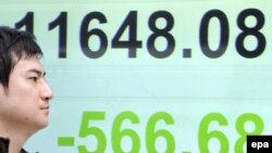 تزريق پول نقد در ژاپن، با رقمی معادل ۲۴ ميليارد دلار، بزرگترين مورد طی شش ماهه گذشته بود.(عکس: epa)