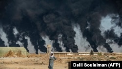 Сирия менен Түркиянын чек арасындагы Рас аль-Айн шаары. 16-октябрь, 2019-жыл.