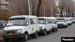 Armenia - Commuter minibuses are parked on a street during a public transport strike in Yerevan, 16 January 2018.