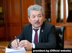 Адылбек Касымалиев.