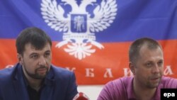 Гражданин России, москвич Александр Бородай (справа) и Денис Пушилин – на то время главари группировки «ДНР», которая признана в Украине террористической. Донецк, 29 мая 2014 года