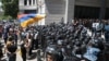 Armenia - Riot police guard a government building during an opposition demonstration in Yerevan, May 31, 2022.
