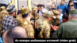 Маросими ба наздиконаш додани ҷасади яке аз сарбозони кушташудаи тоҷик