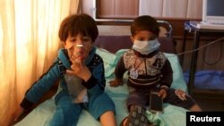 کودکان در بیمارستان شهر توز خورماتو بستری شده‌اند.