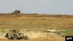 حماس تهديد کرده است که حملات بيشتری را به گذرگاه های مرزی انجام خواهد داد.
عکس از AFP