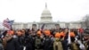 Учасники праворадикального угруповання Proud Boys перед Капітолієм у Вашингтоні