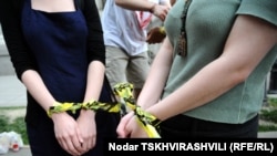 Кыйноолорго каршы акциядан.