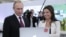 Russia -- President Vladimir Putin and Russia Today (RT) editor-in-chief Margarita Simonyan attend an exhibition marking the 10th anniversary of RT, December 10, 2015.