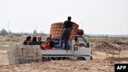 Սիրիա - Հալեպի բնակիչները լքում են քաղաքը, 25-ը հուլիսի, 2012թ.