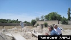 Tajikistan -- Cemetery in district of Bobojon Ghafurov, Sughd region, 24May2012
