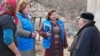 Moldova, Mariana Aga (right) is a specialist in child rights protection and now cares for children from six villages in Calarasi district