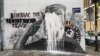 Belgrade Protesters Angered By Arrests Of Activists Who Egged Mladic Mural