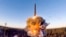 A rocket launches from a missile system as part of a ground-based intercontinental ballistic missile test launched from the Plesetsk facility in northwestern Russia in December 2020.
