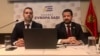 Milojko Spajic (left) and Jakov Milatovic hold a press conference in June in Podgorica.