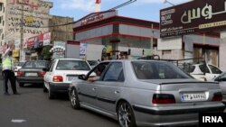 IRAN -- Iranian drivers queu up in long lines at a gasoline station in Tehran, May 1, 2019