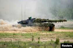 Нямецкі танк Leopard на вучэньнях у Літве ў траўні 2024 году