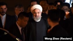 روحانی در چینگ‌دائو، چین. ۱۸ خرداد ۹۷