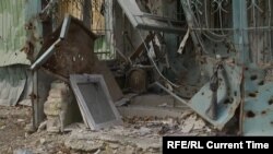 Kherson Residents Try To Keep Warm As Russian Drones Target Cars And Buses