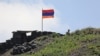 ARMINIA -- An Armenian flag flies at an Armenian border post in the Gegharkunik province, June 18, 2021.