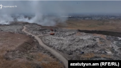 Armenia - A smoldering landfill in Nubarashen, near Yerevan, August 11, 2025.