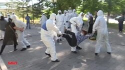 «Безмолвная» акция матерей закончилась задержаниями