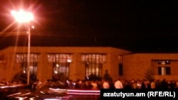 Armenia - Hudreds of people hold a candlelight vigil outside the Harsnakar restaurant in Yerevan, 30Jun2012.
