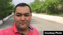 Улан Кошматов.