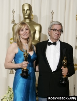 به همراه دایانا اوسانا در زمان دریافت جایزه اسکار در مارس ۲۰۰۶