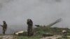 Nagorno-Karabakh - Karabakh Armenian troops fire rounds from a howitzer in the Martakert district, 3Apr2016.