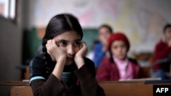 Сирийско дете в лагера в Харманли през 2014 г.