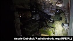 Солдат біля кулемету КПВТ на передовій