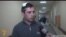 Armenia -- Opposition activist Gevorg Safarian is interviewed by RFE/RL after being assaulted in Yerevan, 28 Nov2014