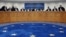 France -- Judges of the European Court of Human Rights (ECHR) get ready for a hearing in Strasbourg, October 14, 2014.