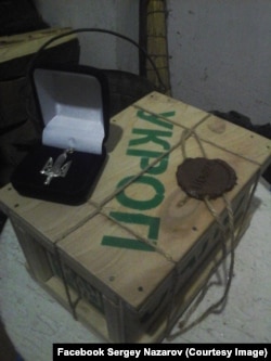 Тризуб, одна з перших волонтерських нагород, який вручили Сергію Назарову