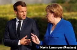 مرکل و مکرون در نشست ماه ژوئیه ناتو
