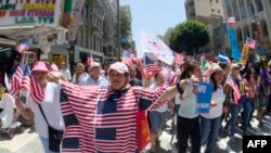 Демонстрация в поддержку иммиграционной реформы в Лос-Анджелесе 
1 мая 2013 года