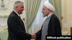 Iran -- President Hassan Rouhani (R) meets with Armenia's Deputy Prime Minister Mher Grigorian, Tehran, July 3, 2019.