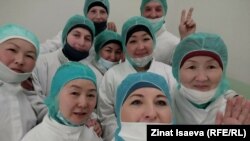 Зинат Исаева жана аны менен иштеген мигранттар.