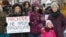 Moscow protesters against the 2017 partial decriminalization of domestic violence hold a placard reading: "Violence is not our tradition!"