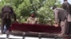 WATCH: Afghan Soldiers' Coffins Transported After Balkh Base Assault